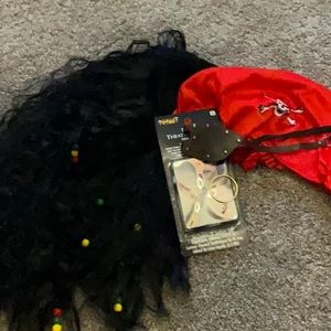 Pirate wig, head scarf, face paint, one gold color hoop earring, eye patch